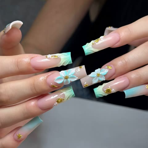 Turquoise ombré French tips with 3D flowers